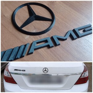 Логотип Mercedes и шильдик AMG на авто.