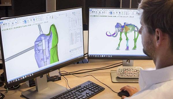 3D-принтеры компании Materialise печатают полноразмерную реплику скелета мамонта