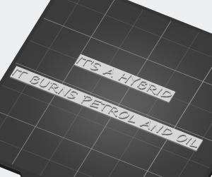 Шилдик для автомобиля "IT'S A HYBRID IT BURNS PETROL AND OIL"