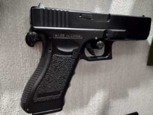 Крепление пистолета на стену