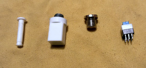 Кнопочный выключатель для крепления на панели корпуса.