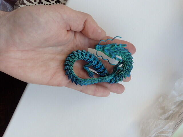 Фото напечатанных моделей филаментом ePLA-SILK MAGIC сине-зелёный от фирмы eSUN