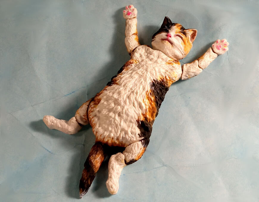 Счастливая кошка