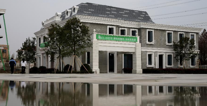Шанхайская компания WinSun напечатала пятиэтажный дом и особняк