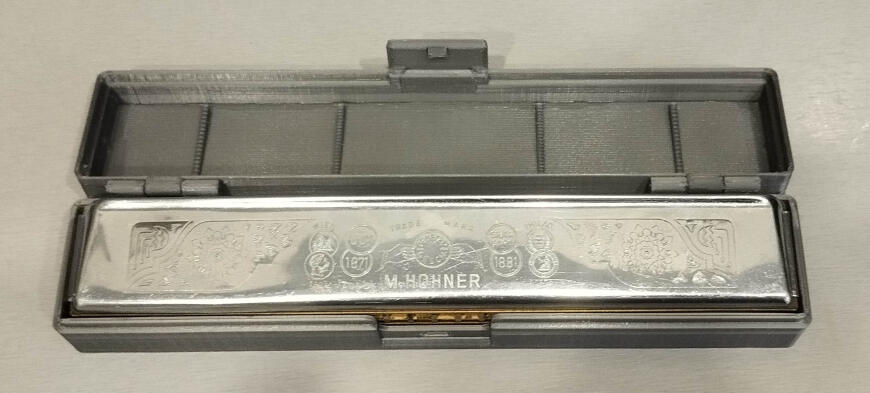 Футляр губной гармошки