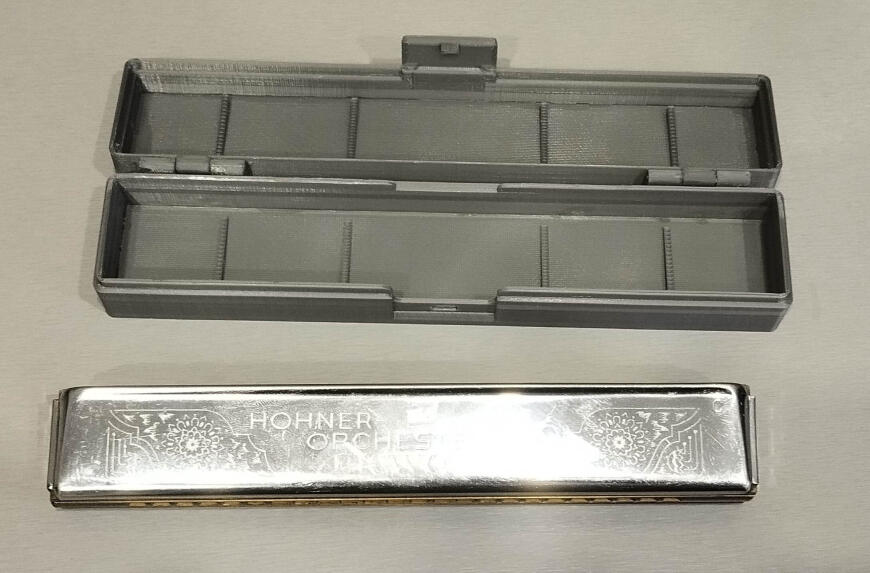 Футляр губной гармошки