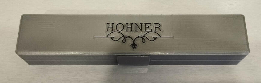 Футляр губной гармошки