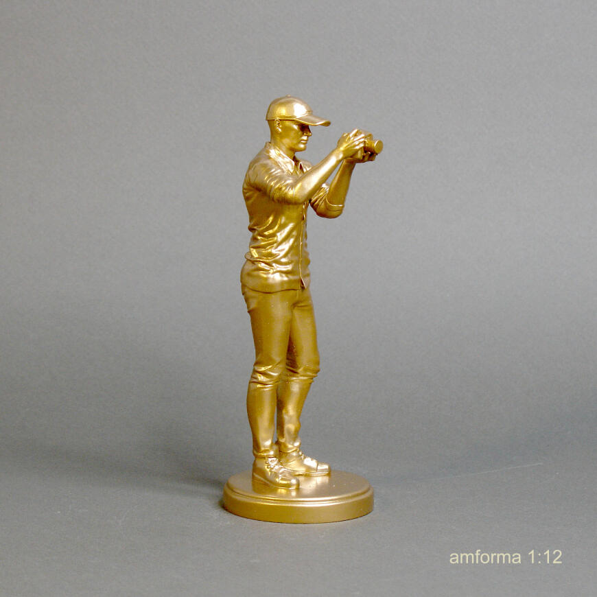 Статуэтка фотограф.