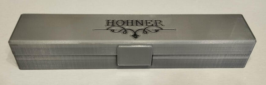 Футляр губной гармошки