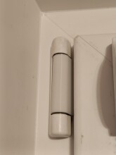 Декоративная накладка на петлю стеклопакета