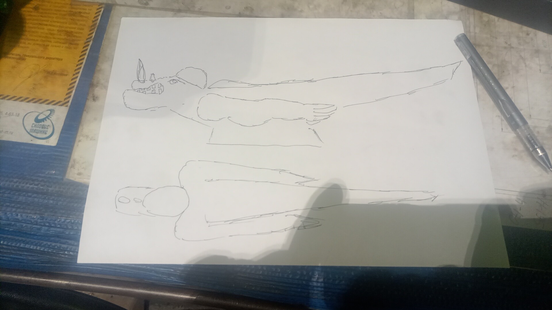 Нужен маскот носорога на мотоцикл