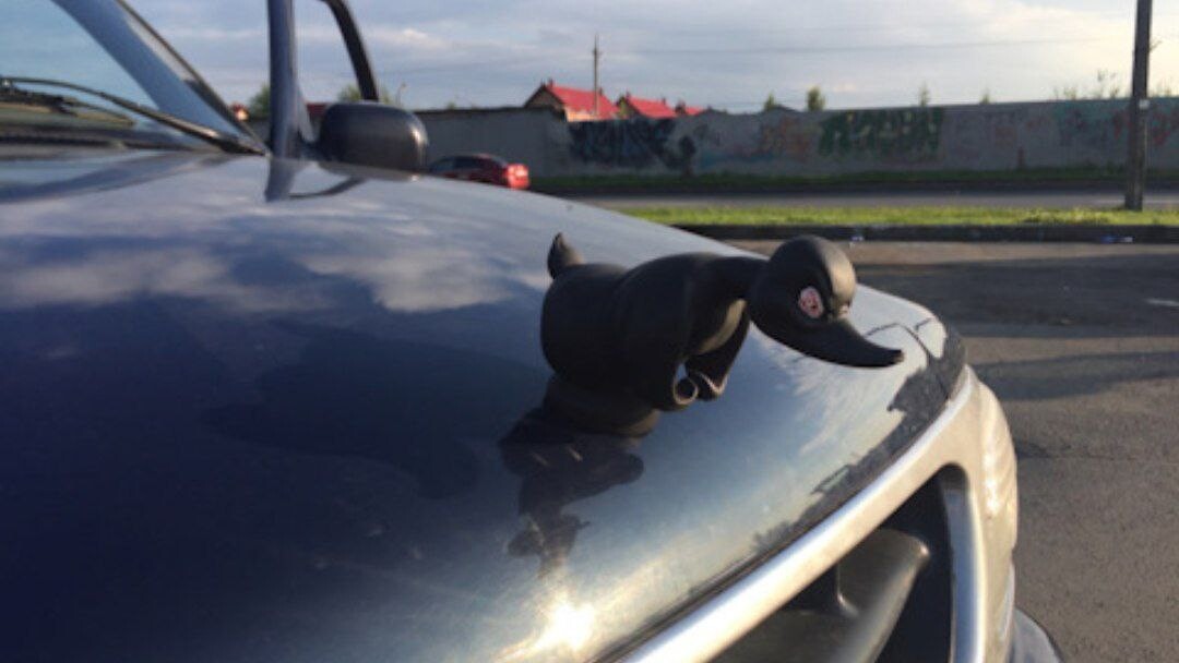 Нужен маскот носорога на мотоцикл