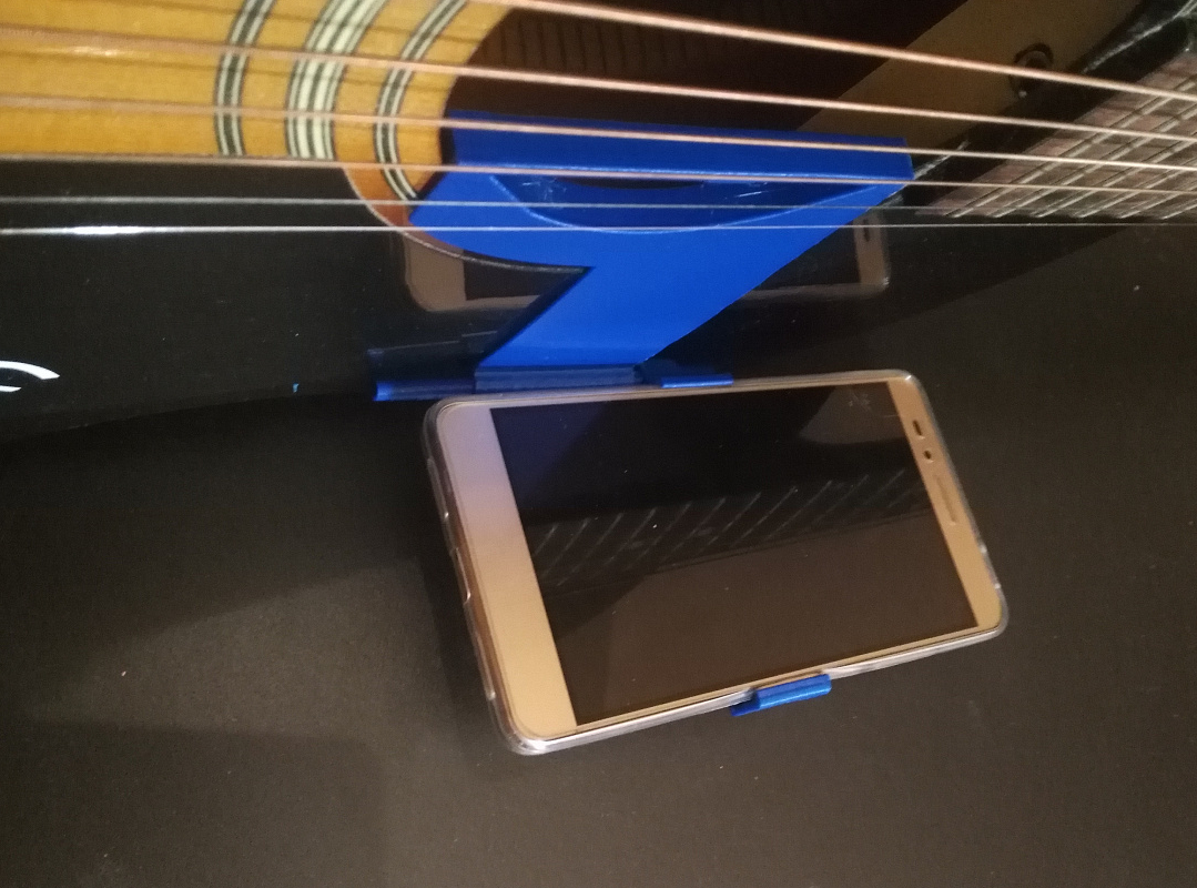 Gitar çalmak için telefon tutucusu (Plastik Aparattır!!!)