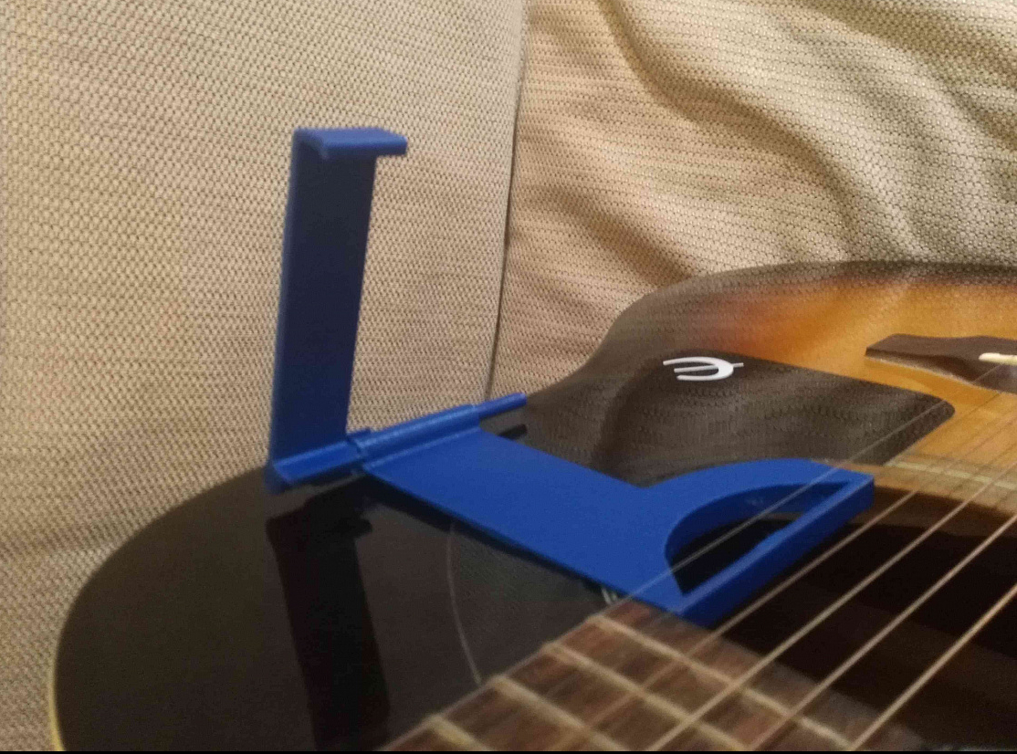 Gitar çalmak için telefon tutucusu (Plastik Aparattır!!!)
