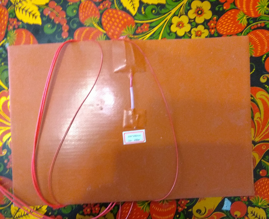 Селиконоапя грелка 12в 