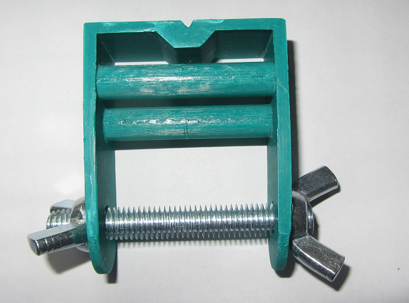 Сервировочная машинка для тетивы