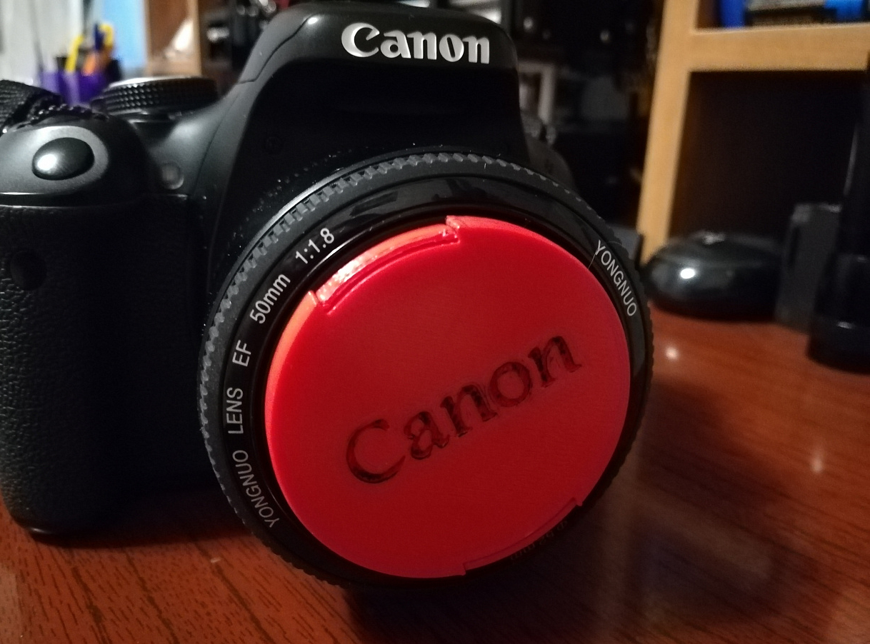 52 mm dişli, Canon logolu lens kapağı (Plastik Aparattır!!!)