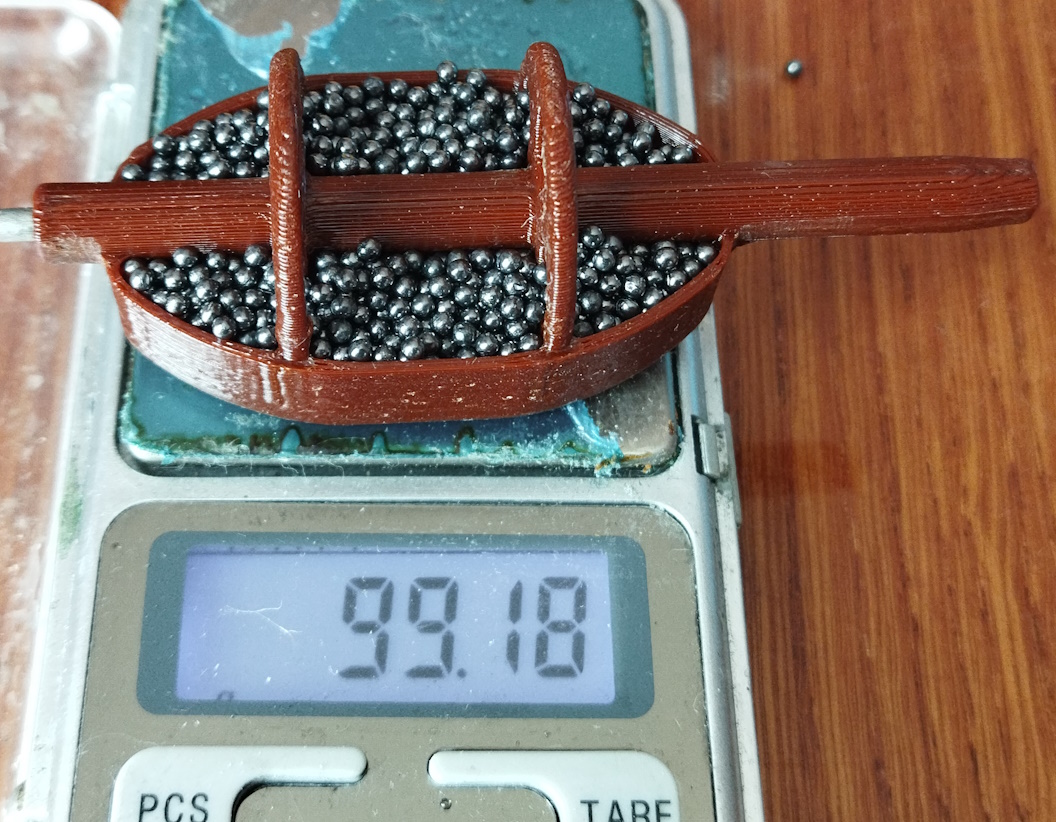 Ticari bir baskı makinesinin altındaki düz besleyici. (Plastik Aparattır!!!)